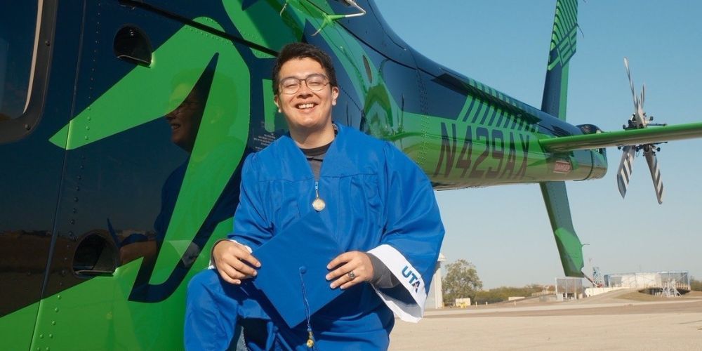 Jovanny Murillo, a 2025 UTA aerospace engineering graduate, stands next to a Bell Helicopter. (UTA Photo)" style=" height:500px; width:1000px" _languageinserted="true" src="https://cdn.prod.web.uta.edu/-/media/0a6cefd1b881428c8c50988b5206cbcd.jpg