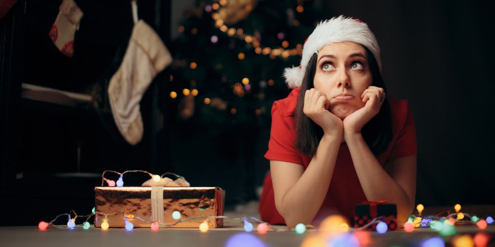 A woman pouts while in holiday attire.
