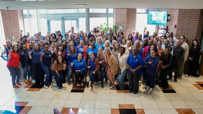 A group photo of all UTA School of Social Work faculty and staff. (Photo by Doughlas Gutierrez)