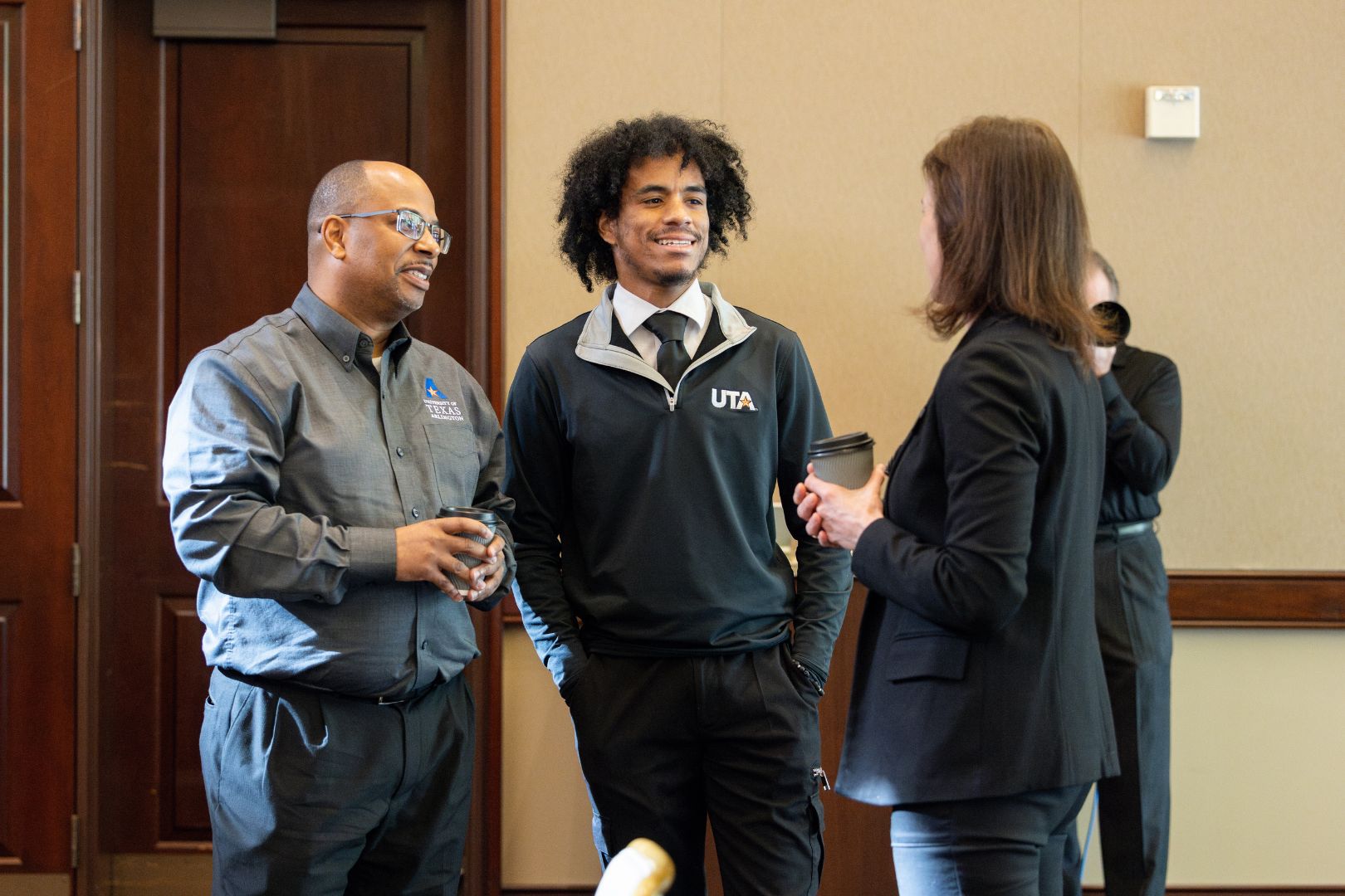 Image shows the director of Emerging Mavericks and a student in the program 
