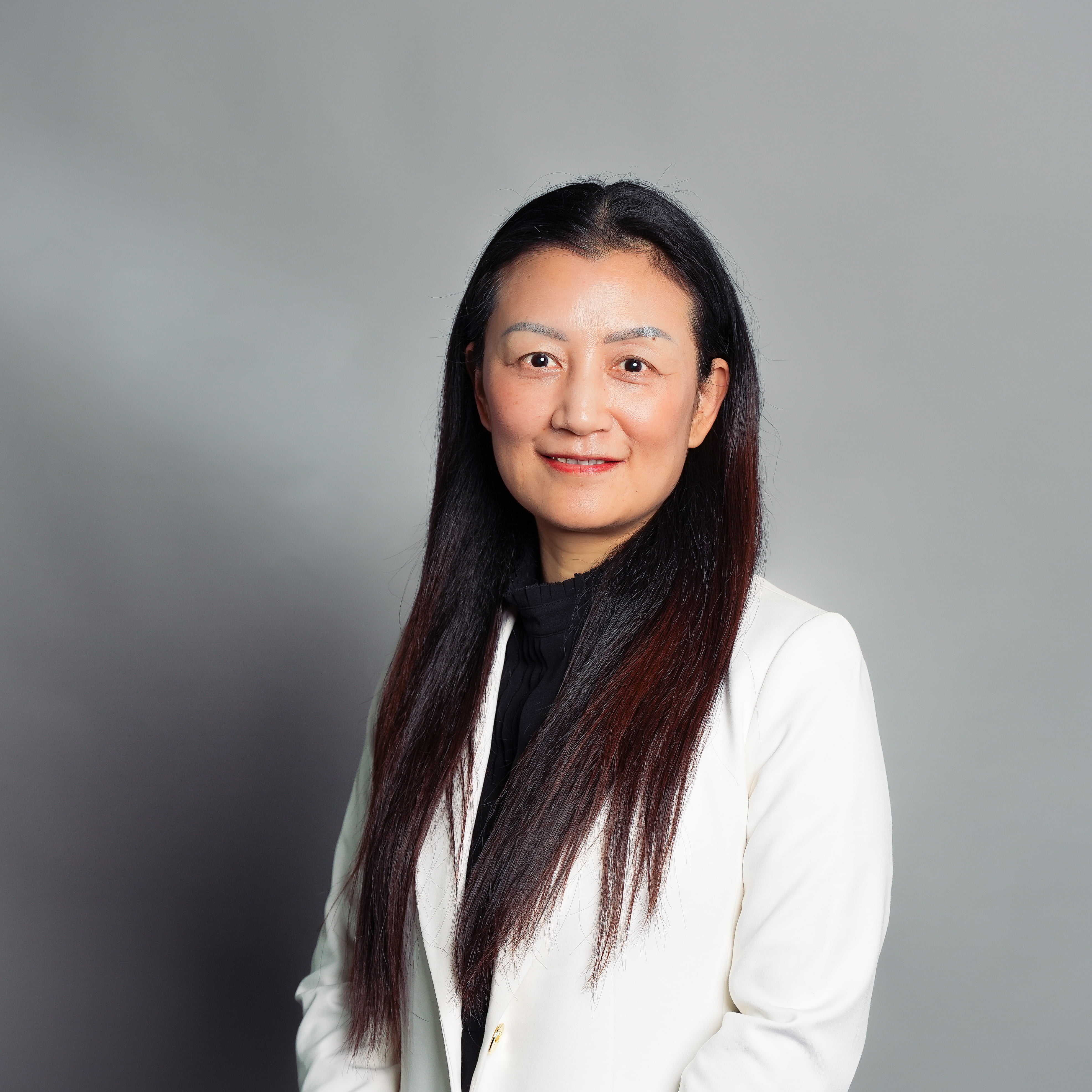 University of Texas at Arlington Associate Professor, Dr. Ling Xu, poses for a photo.