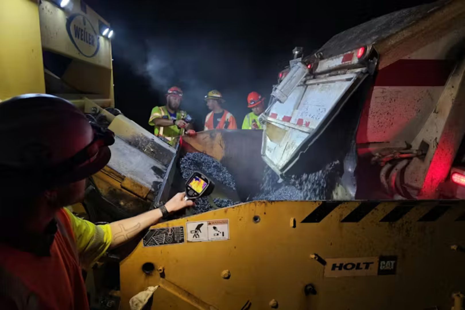 Image shows plastic road being paved " style=" height:1080px; width:1620px" _languageinserted="true" src="https://cdn.prod.web.uta.edu/-/media/d4a76a69fd454f668ae801fc71a03758.jpg
