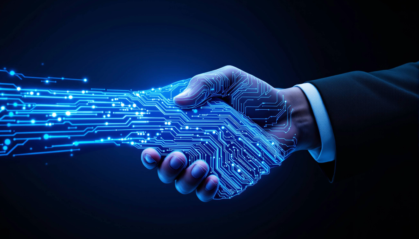 A human hand in a suit shakes hands with a glowing digital circuit hand, symbolizing partnership between people and technology.