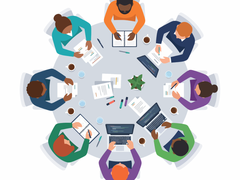 Overhead view of people seated around a round table holding coffee cups during a collaborative discussion, representing peer learning, conversation, and knowledge sharing.