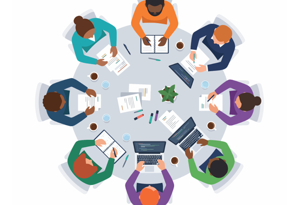Overhead view of people seated around a round table holding coffee cups during a collaborative discussion, representing peer learning, conversation, and knowledge sharing.