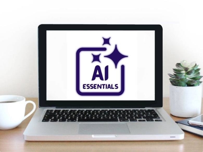 Image is of a laptop saying AI Essentials