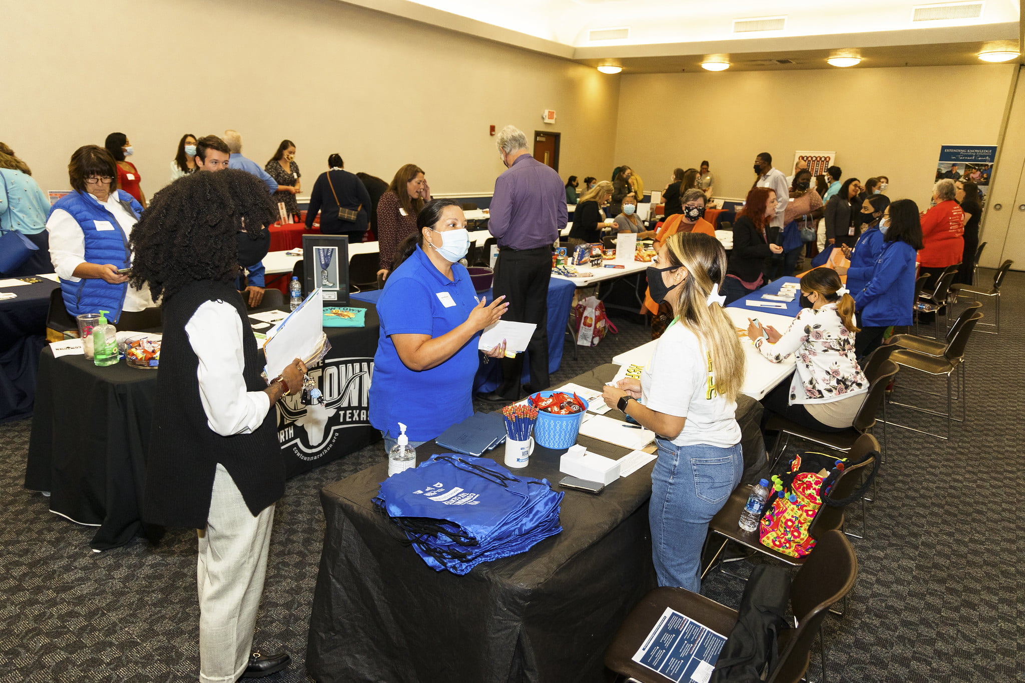 faculty networking with community partners at the Community Partner Breakfast event