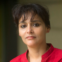 Ritu Khanduri dressed in a nice blouse with earrings