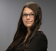 headshot of Falicity Santos-Higginbotham