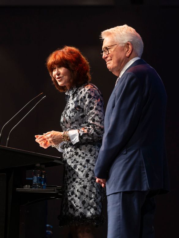 Diperts speaking at podium at the 2025 Distinguished Alumni Awards