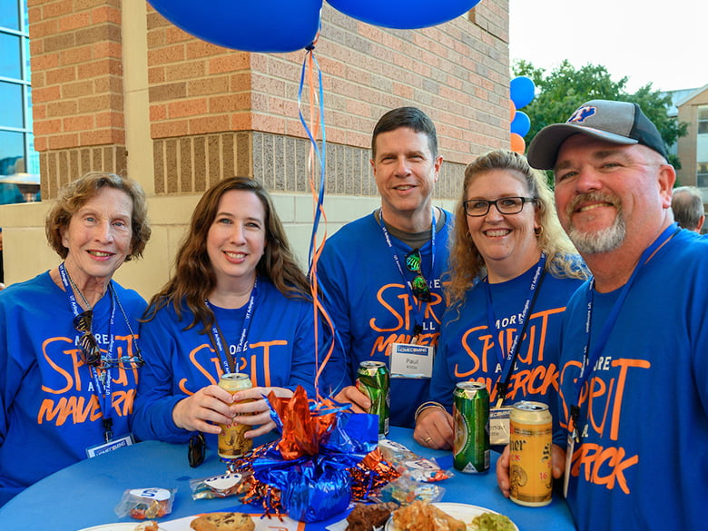 Alumni at a homecoming dinner