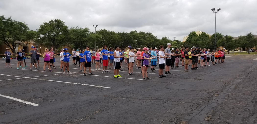 Student praticing marching band drills