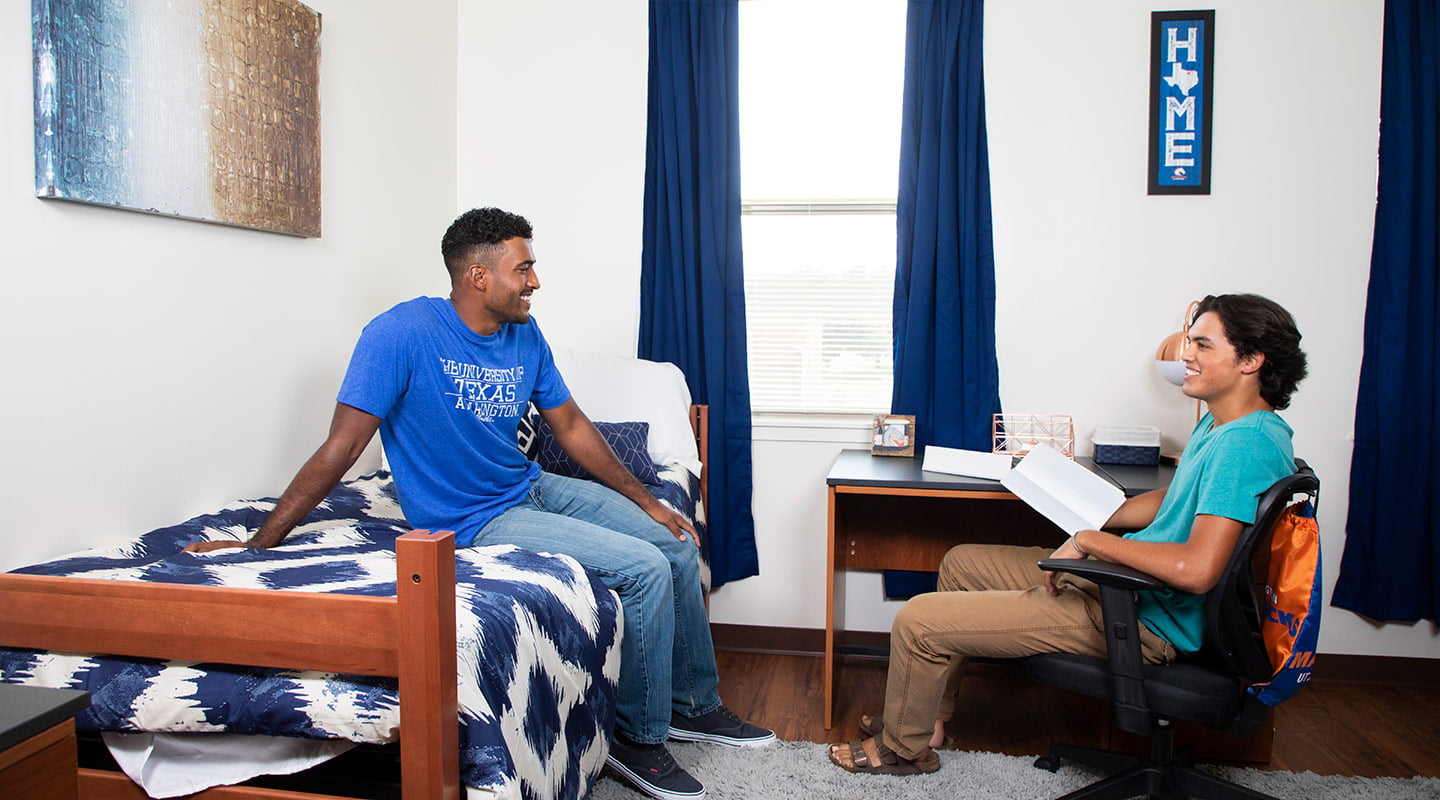 Two male students in a West Hall room