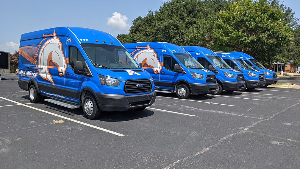 photo of vans in a parking lot" src="https://cdn.prod.web.uta.edu/-/media/project/website/campus-ops/pats/images/vans.png