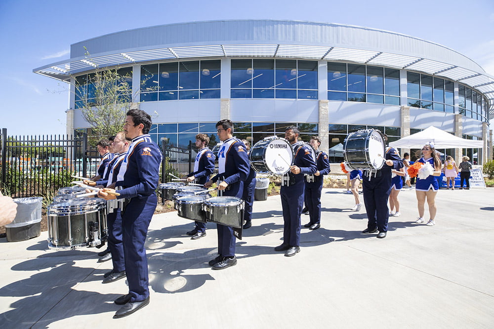 People Playing Drums outside of the Commons