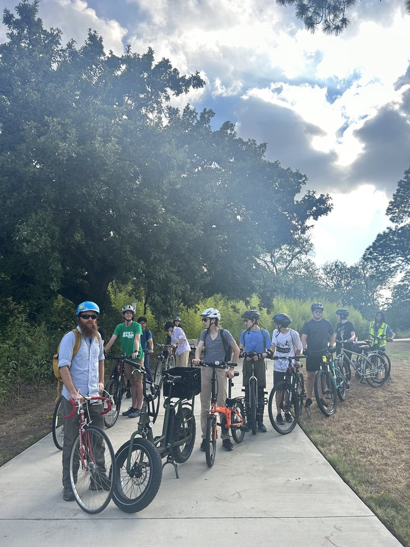 Weekly group ride stopping for a picture.