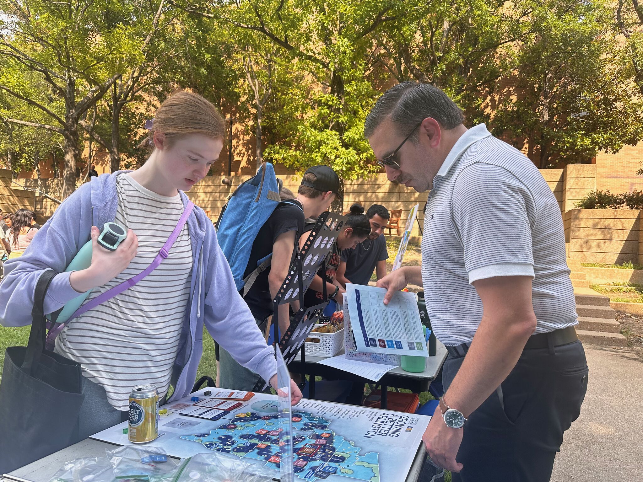 Student pointing at the game