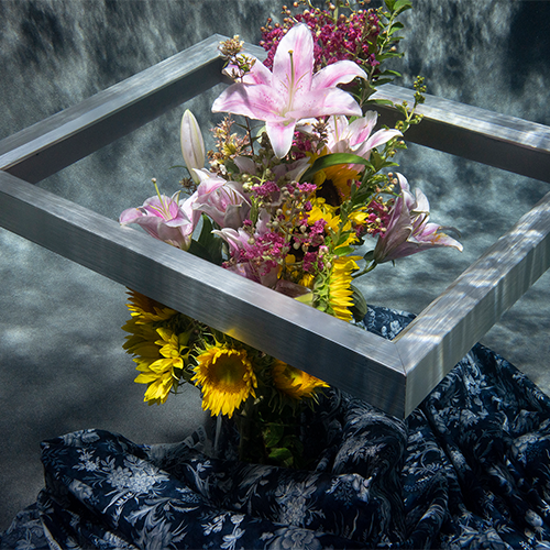 A photo of a open box with flowers