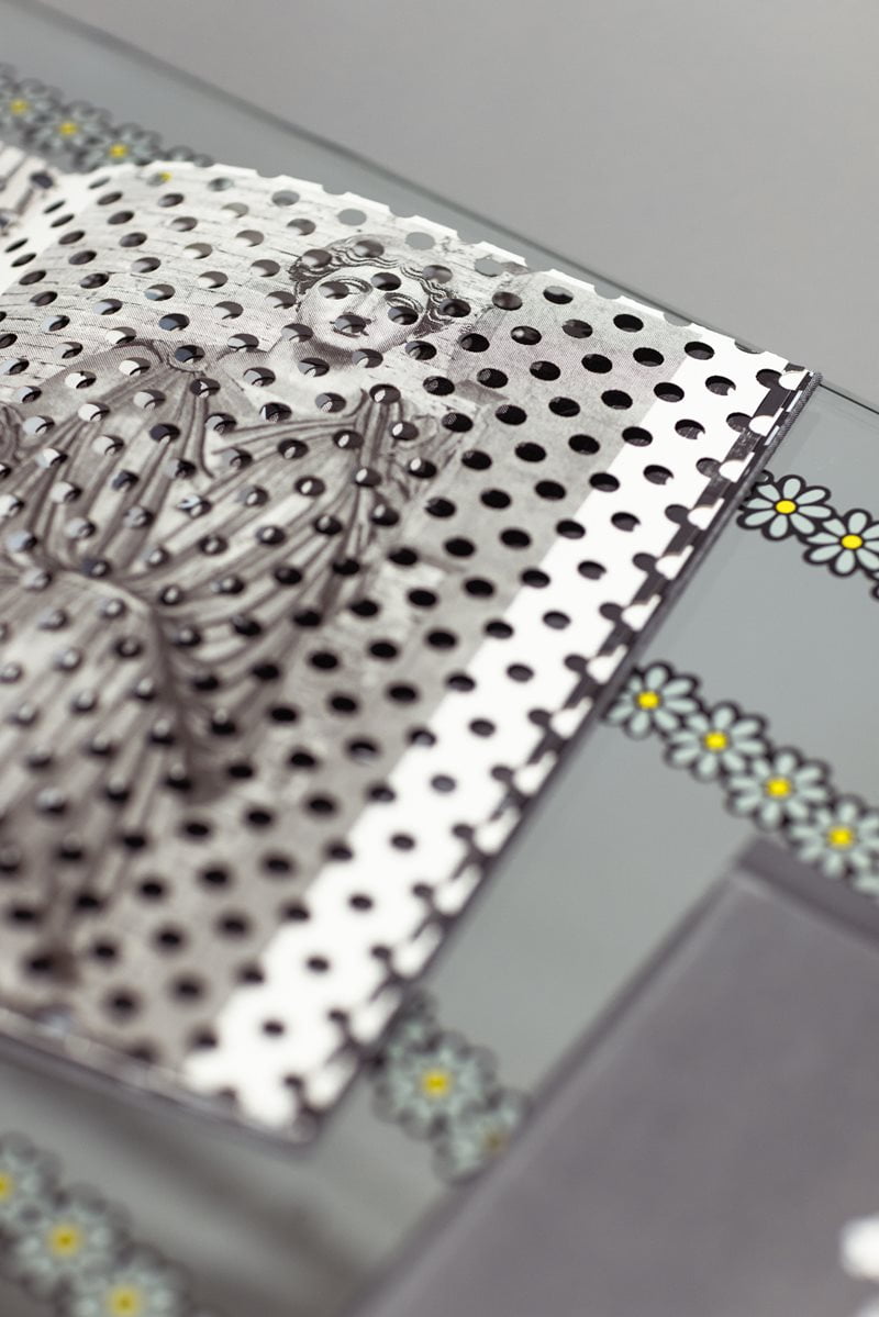 Close-up of a book with a design