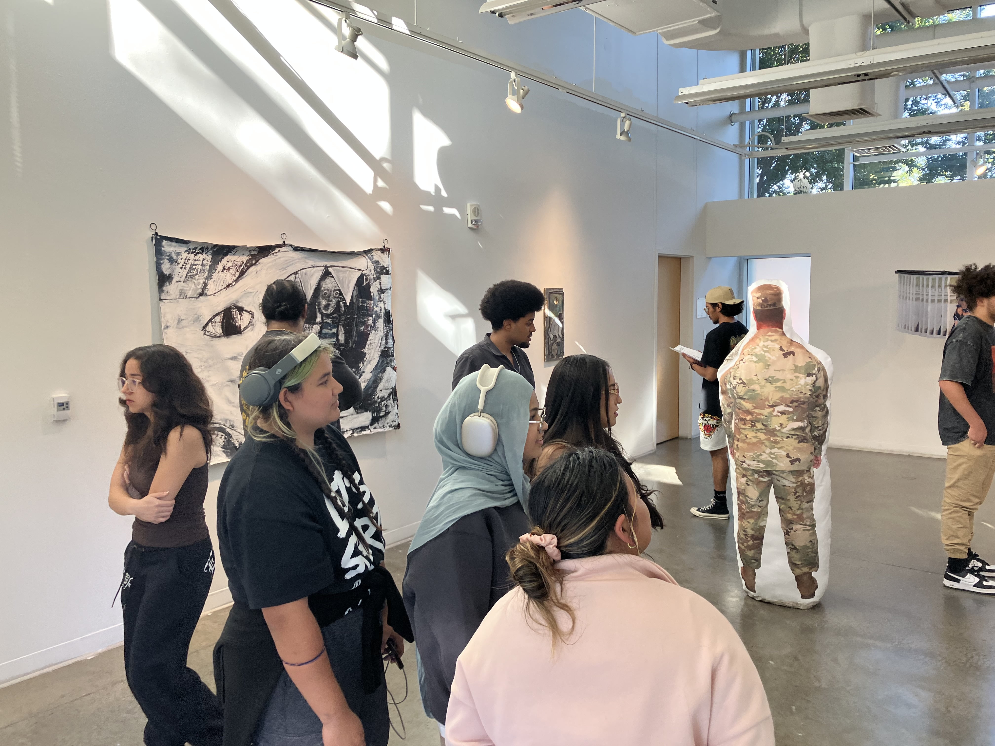 Visitors at the "Yeah But" Exhibition