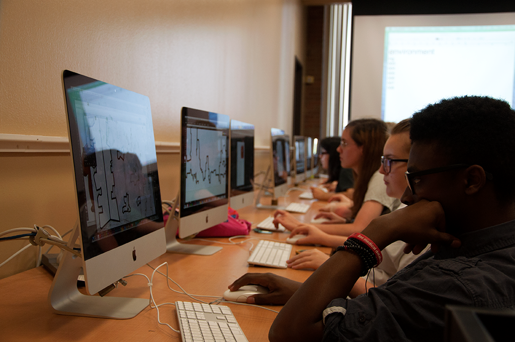 An image of people using computers