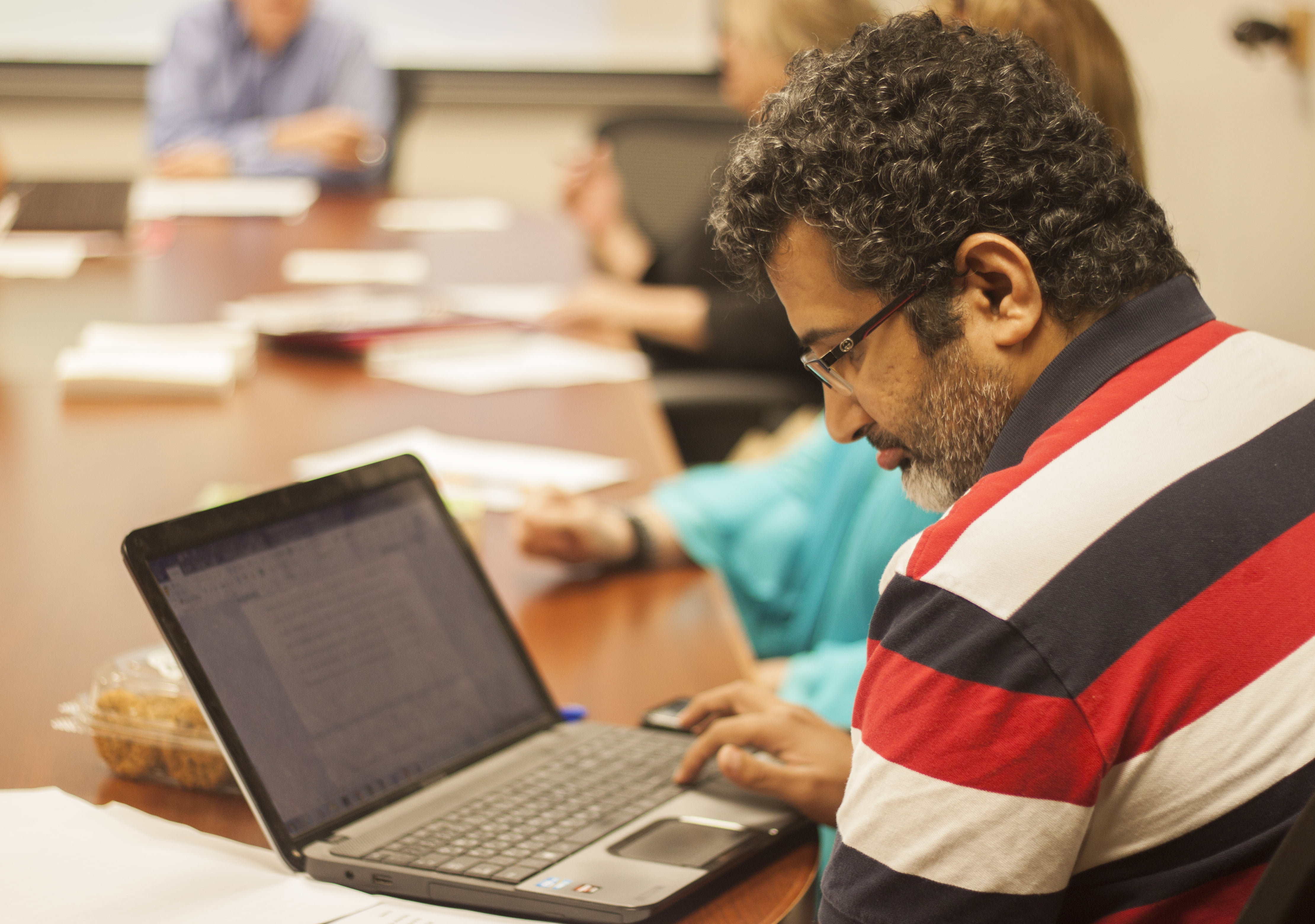 grad student using laptop