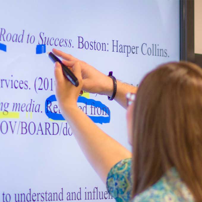 Person using whiteboard