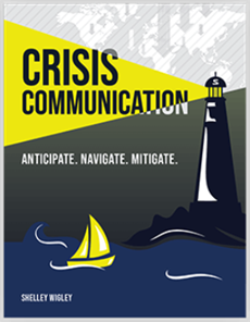 Crisis Communication cover. It's a graphic/drawing of a lighthouse overlooking water that has a sailboat in it. At the very top is a map of the world with arrows pointing down.