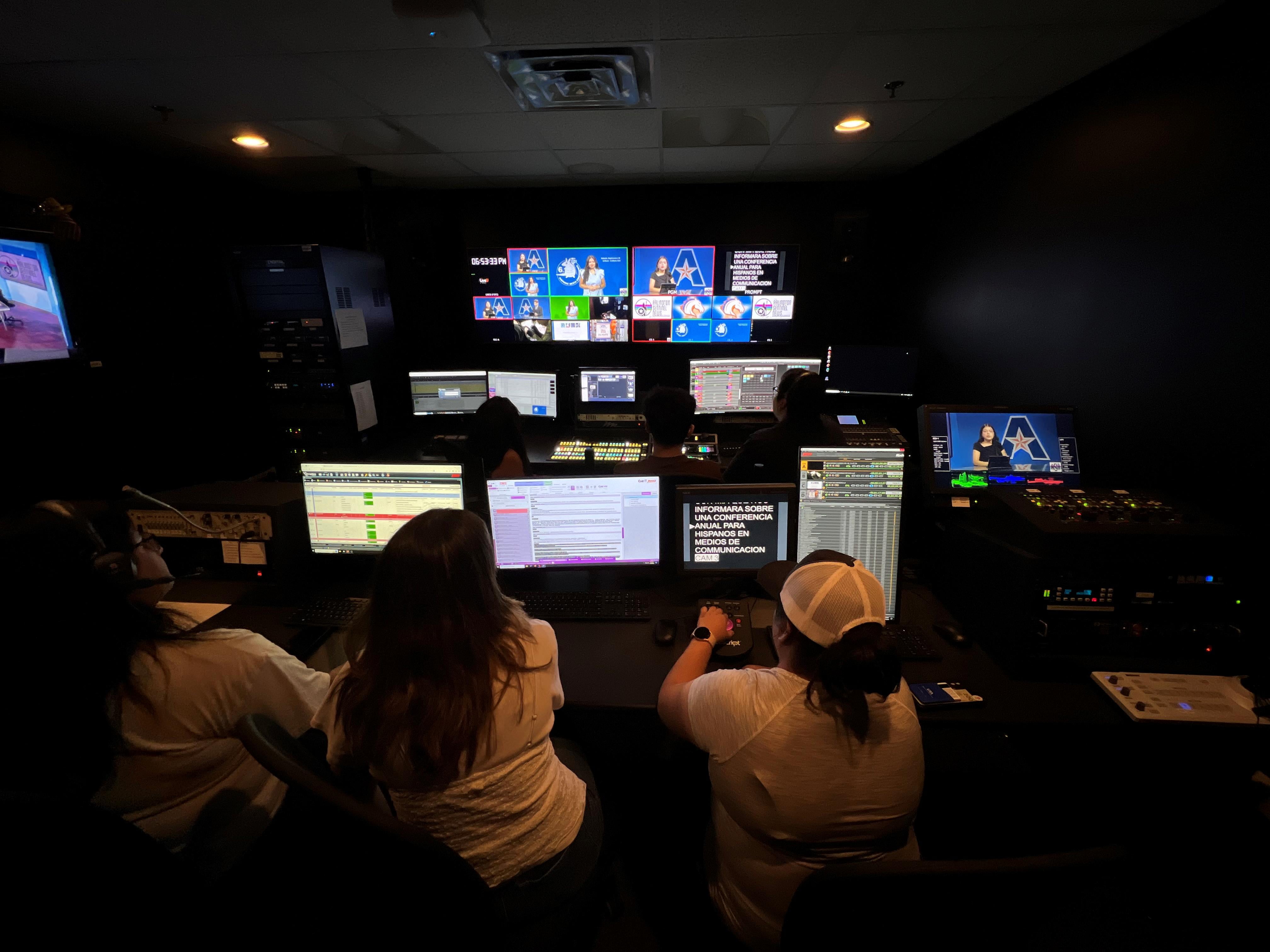 Students in the broadcasting room in the Fine Arts Building