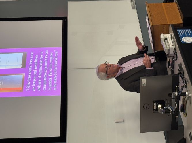 Speaker Mike Farris facing the audience, giving his presentation.