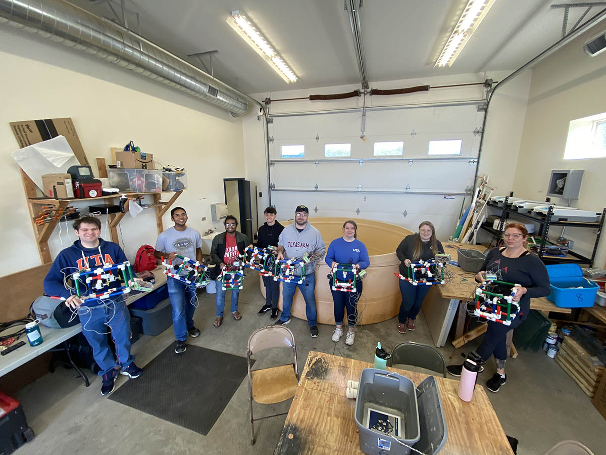 An image of people with Huron Field School Robots