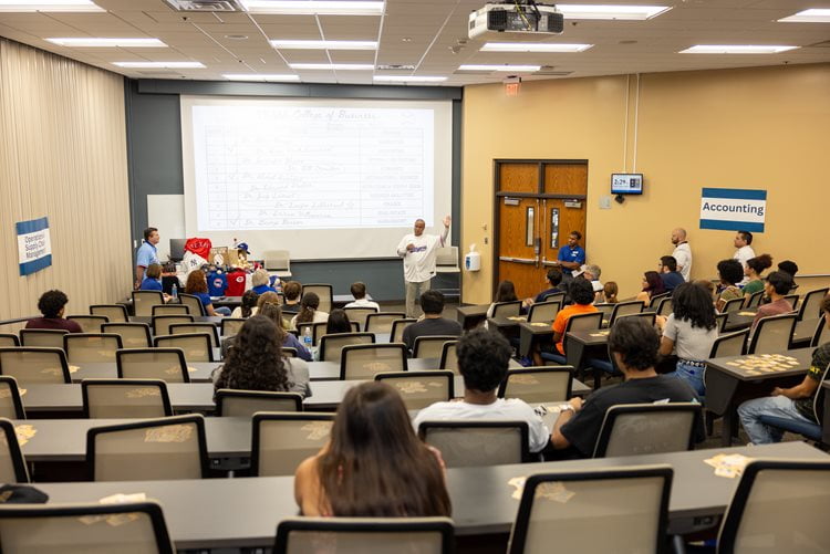 A Department Chair explains his department's classes and majors at the 2024 Meet the Majors Event. (Photo by Jalen Larry)