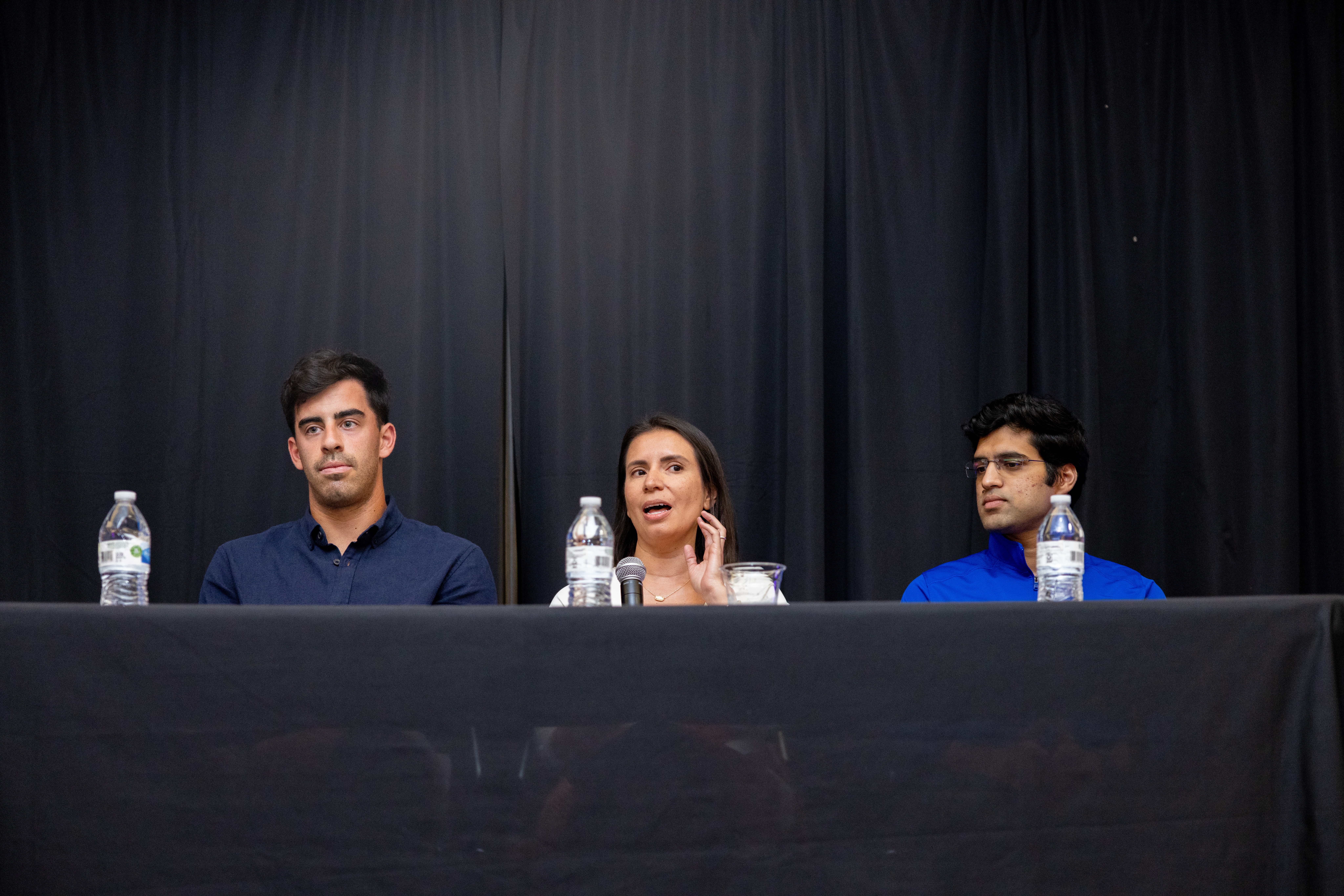 A panel of graduate students, Solano Caffarena (Left), Johanna Hernandez (Middle), and Aashish Choudhary (Right), answer questions relating to graduate programs at the Admitted Graduate Students event August 29, 2024. (Photo by Jalen Larry) 
