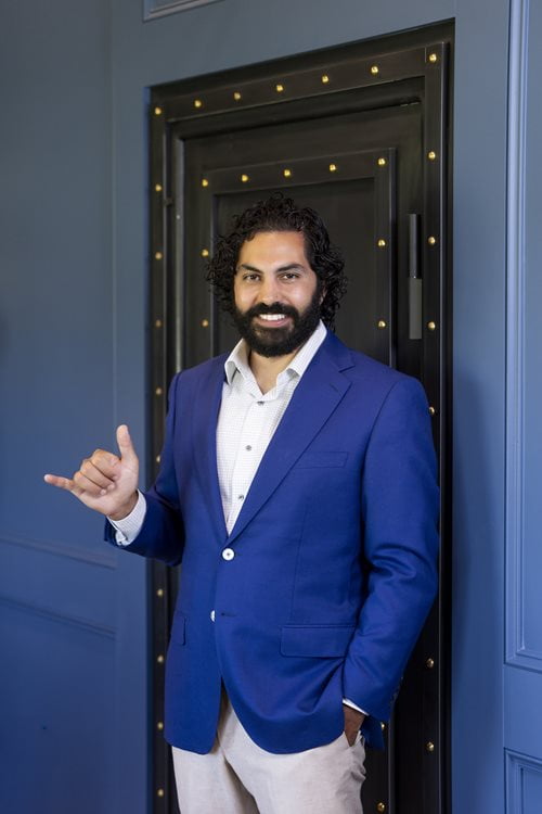 Andrew Feghali poses for a photo.