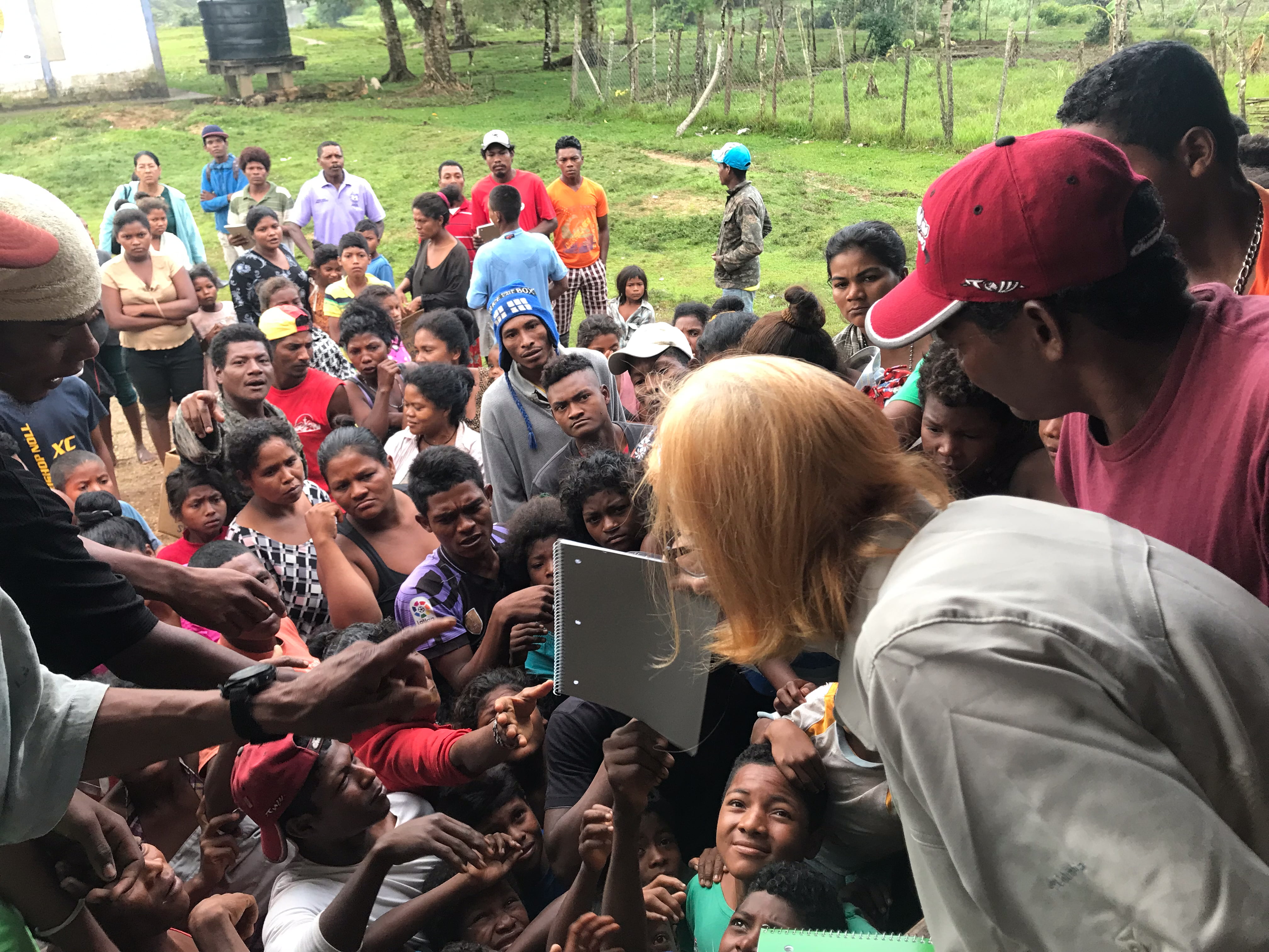 Volunteers with Send Hope hand out school supplies to young students of the Mosquito Coast region of Honduras. (Courtesy photo)