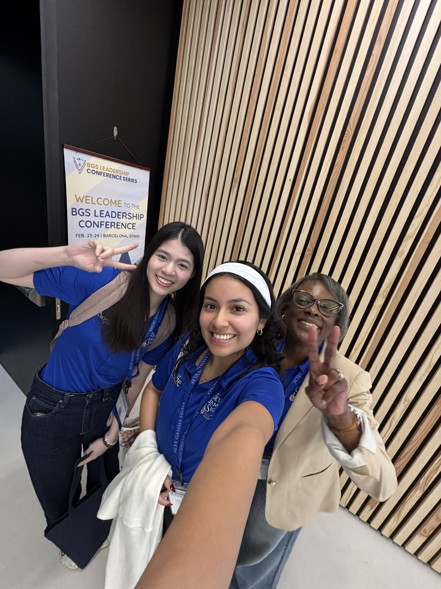 Vega, Phan and Dr. Cocchiara pose for a photo.