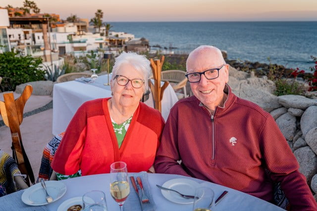 John and Judy Goolsby pose for a photo at dinner. 