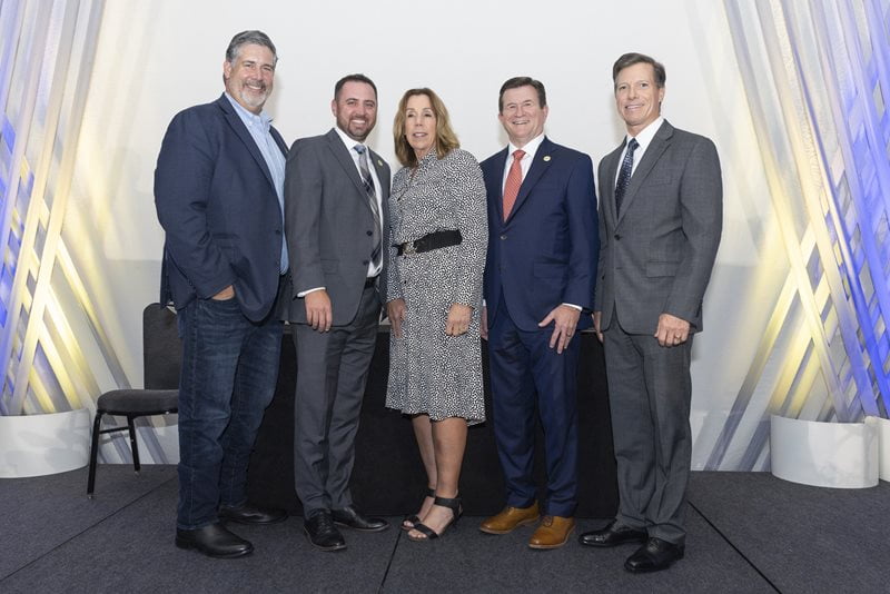 From left to right: James Sellers, Jake Bailey, Kelly Roberts, Dean Harry Dombroski and Brian White pose together for a photo.