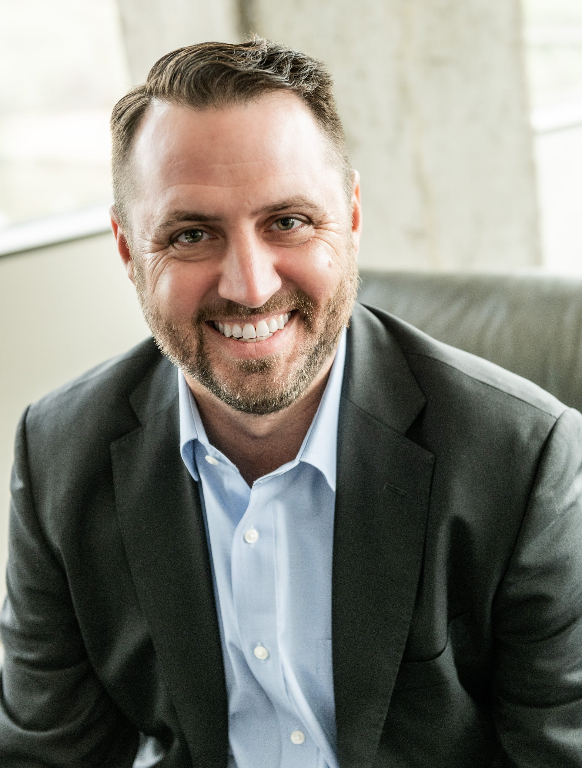 Jake Bailey smiles for a headshot.