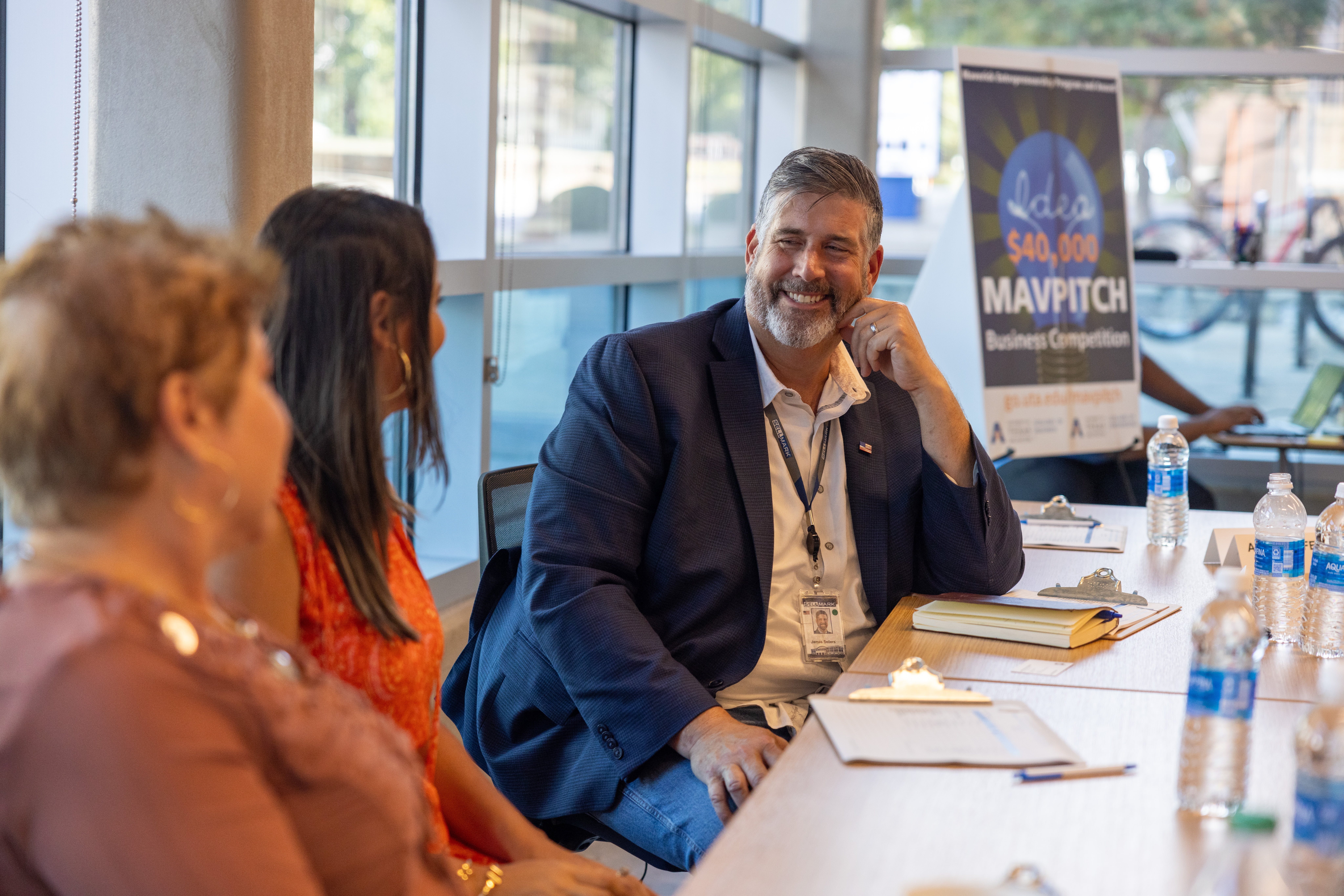 MAVPitch judges smile and chat between rounds of the MAVPitch Final Round on August 15th, 2024. (Photo by Jalen Larry) 