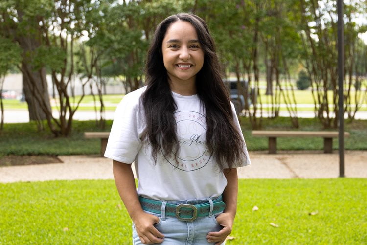 Ace Swenson, founder of Ace's Place Animal Rescue, poses for a photo the University of Texas at Arlington.