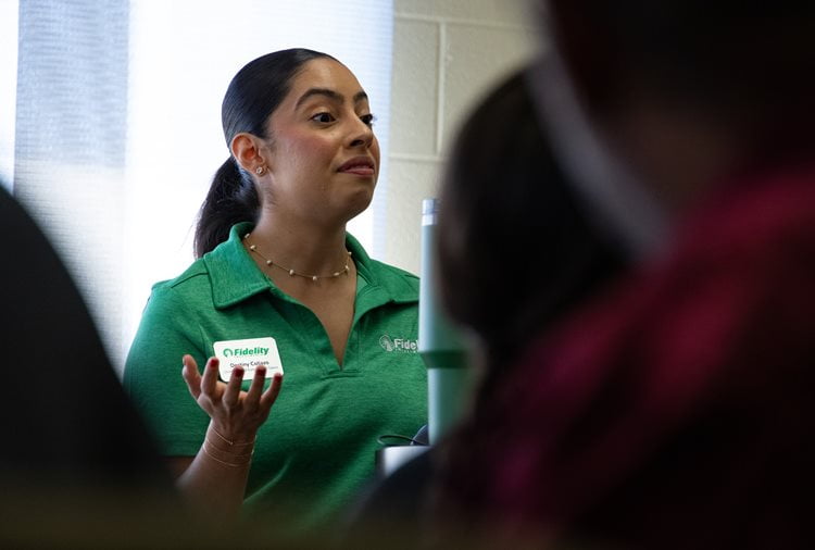 A member of Fidelity Insurance speaks to UTA College of Business Students during a Finance and Real Estate Employer’s and Organization’s Week luncheon. (Photo by Thomas Johns)