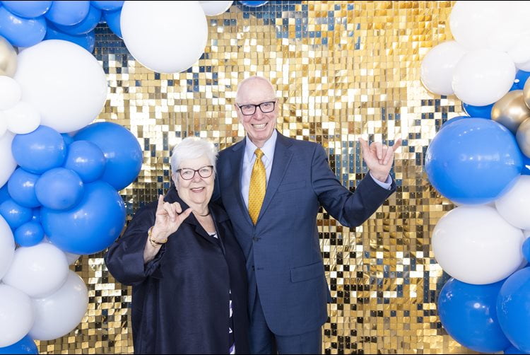 John and Judy Goolsby give the “Go Mavs” hand sign during the Goolsby Leadership Academy 20 Year Anniversary event at the University of Texas at Arlington, April 29, 2024.