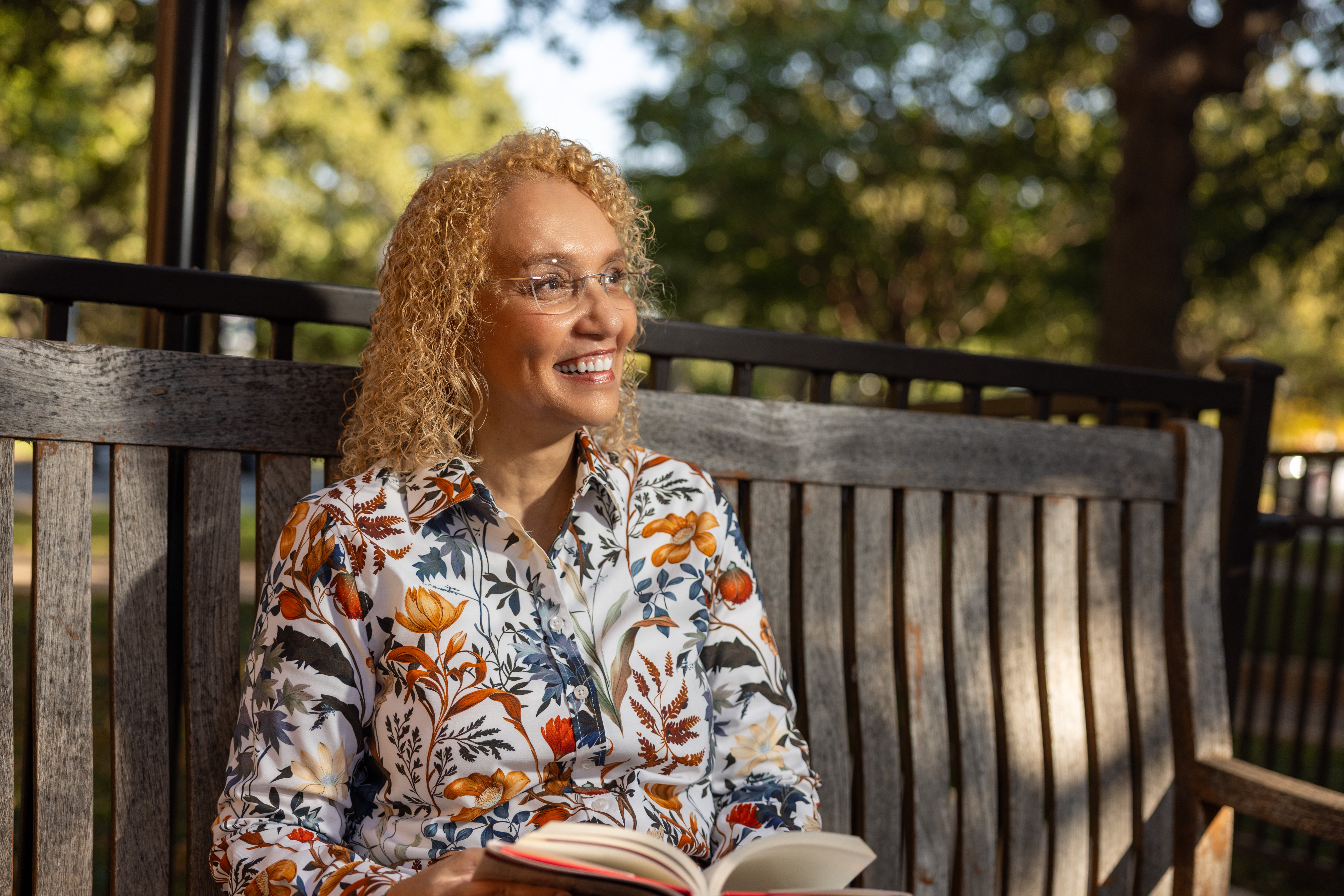 Michaela Mora, Master of Science in Marketing Research graduate program advisor, poses for a photo in front of the University of Texas at Arlington College of Business. (Photo by Jalen Larry)