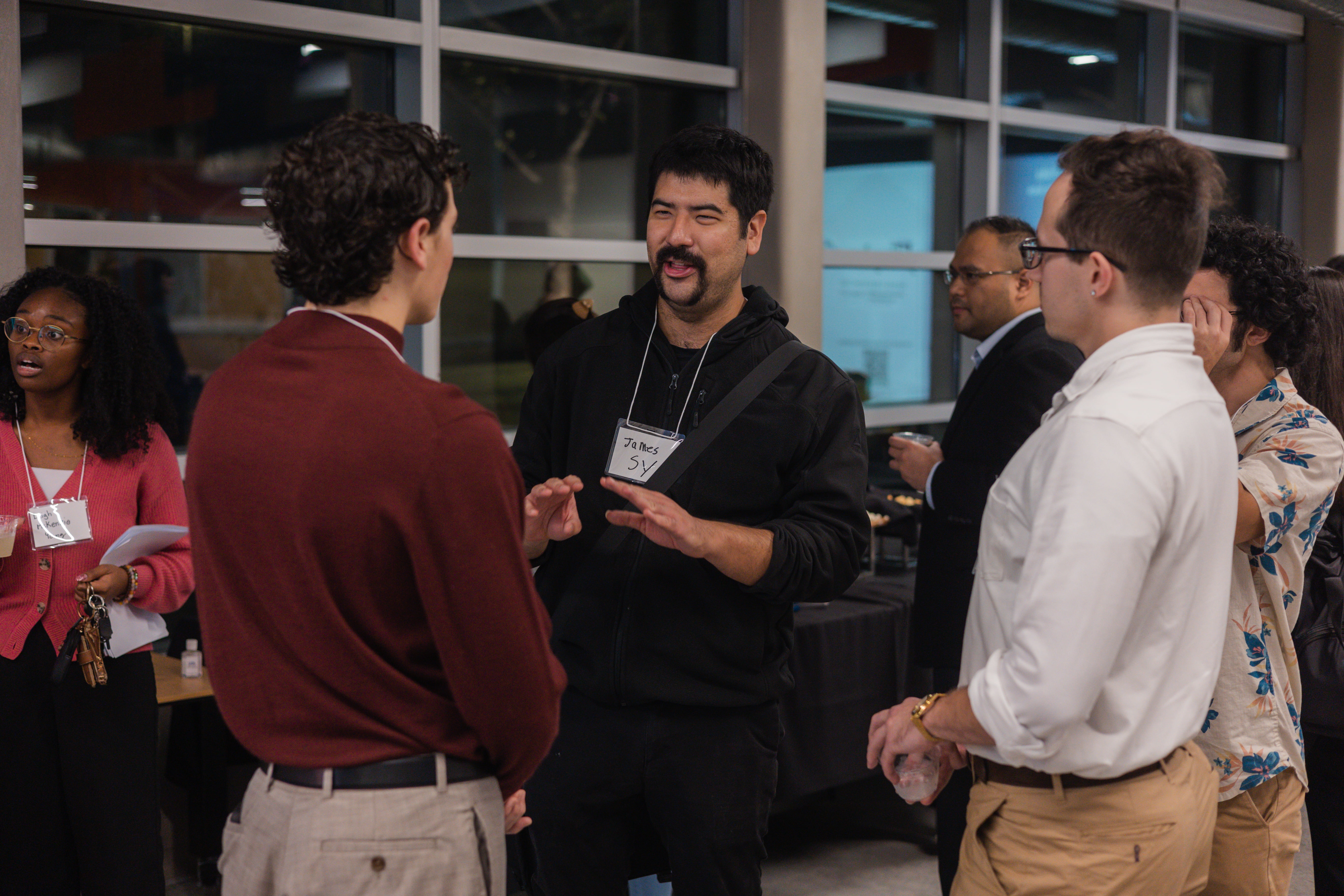 Attendees of Maverick Networking Night mingle and network after an Elevator Pitch Competition. (Photo by Megan Piotrowski)