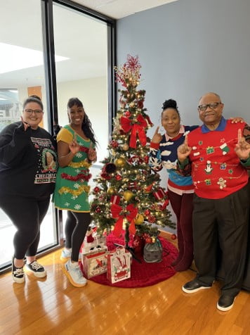 Tamiko with the Baileys Premier Services team at their 2022 company Christmas party