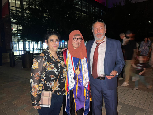Usra Qureshi with her mother and father.