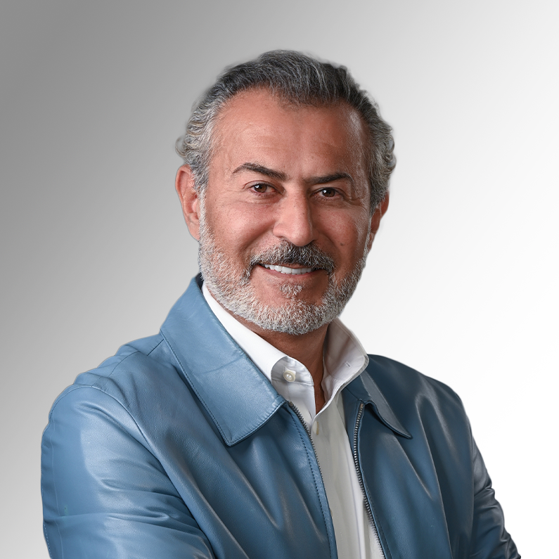 Sam Mahrouq poses for a headshot. 