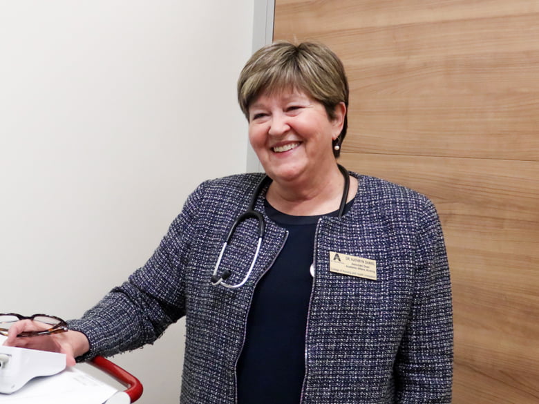 Kathy Daniel wearing stethoscope