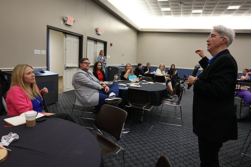 Jill Whitfill speaking at RNO Conference.